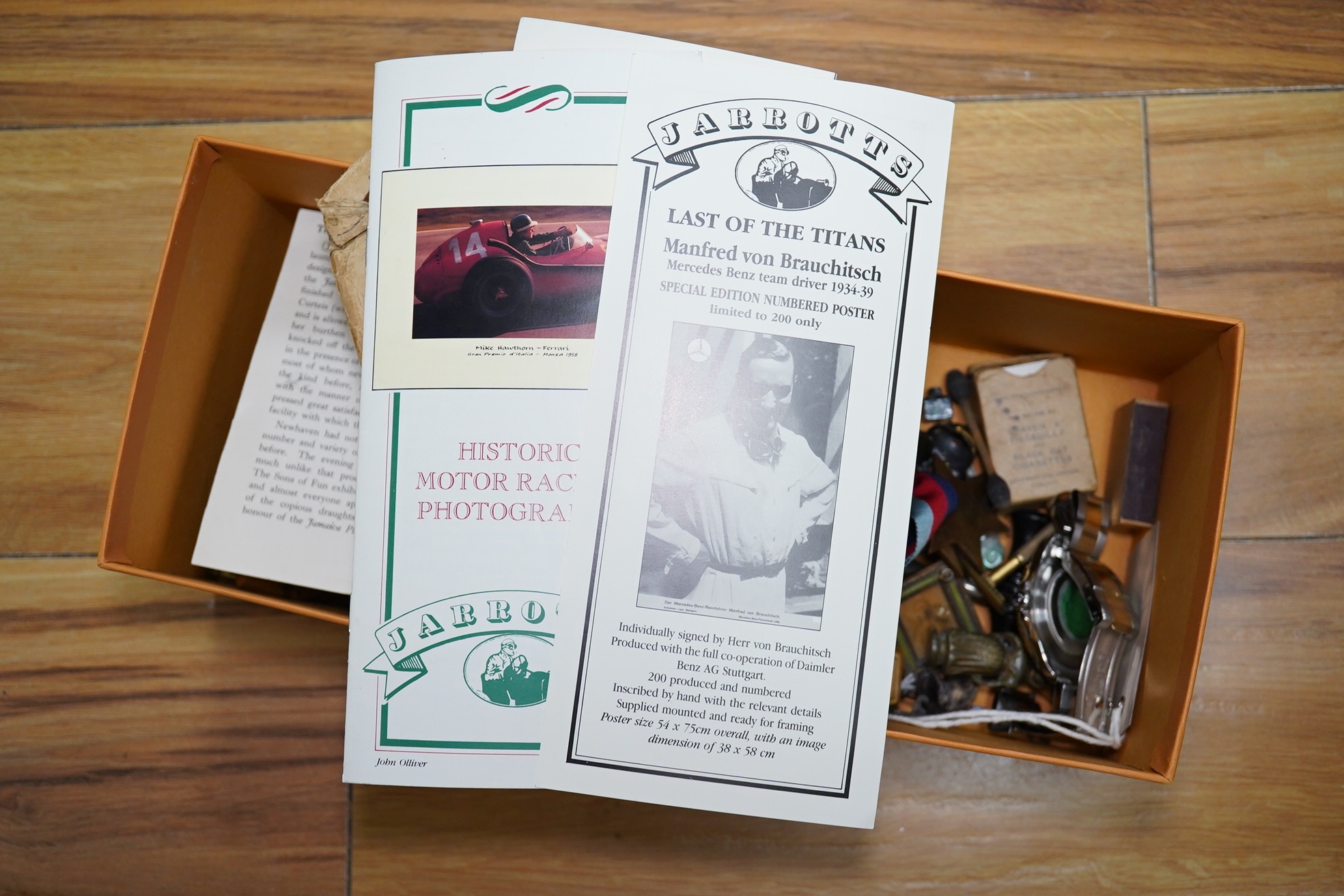 A box of assorted curiosities including vesta cases, one in the form of a skull, medals, section of Japanese inro and miniatures. Condition - varies